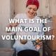 What is the main goal of voluntourism?